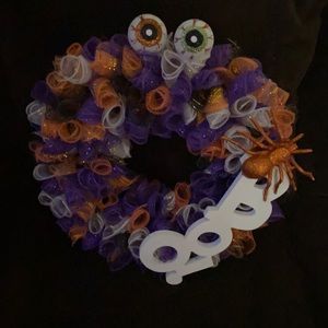 Handmade wreath roughly 20” wide